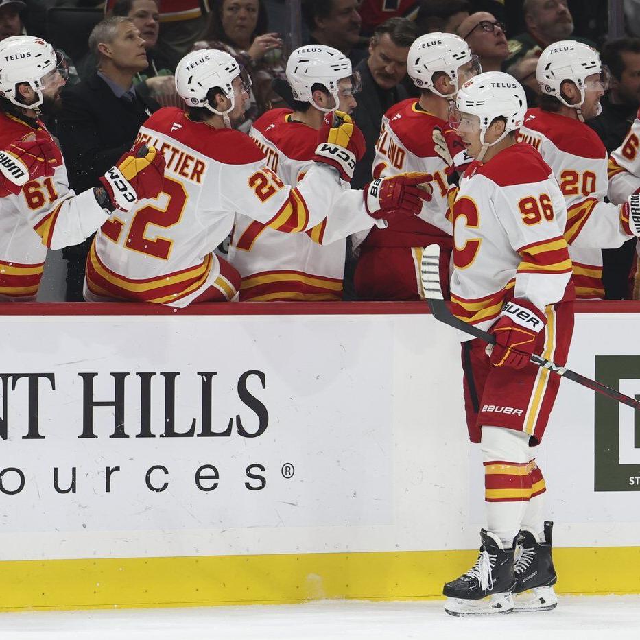 Kuzmenko scores twice as Flames hold off Wild for 5-4 win